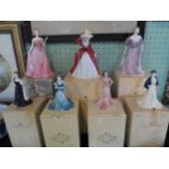 A collection of seven Coalport figurines, each with original box,