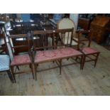 An Edwardian mahogany three piece salon suite,