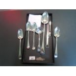 A harlequin set of four silver tablespoons, various dates and makers,