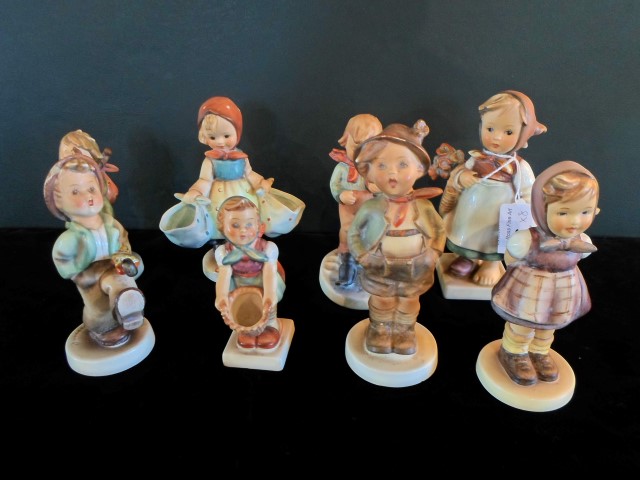 A collection of eight Hummel figurines, to include examples: 258, 204, 175, 300 and others.