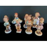 A collection of eight Hummel figurines, to include examples: 258, 204, 175, 300 and others.