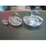 A graduated set of three cut crystal bowls with silver mounts, modelled as swans, stamped 925,