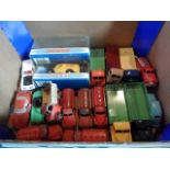 A mixed quantity of Dinky die-cast vehicles, largely in play worn condition with some re-paints,