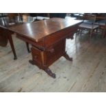 A 20th century oak two drawer side table/desk.