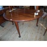 A late Georgian mahogany drop-flap dining table on pad feet, (137cm wide).