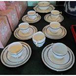 A mid-20th century Taylor & Kent Staffordshire part-tea service, a six place setting,