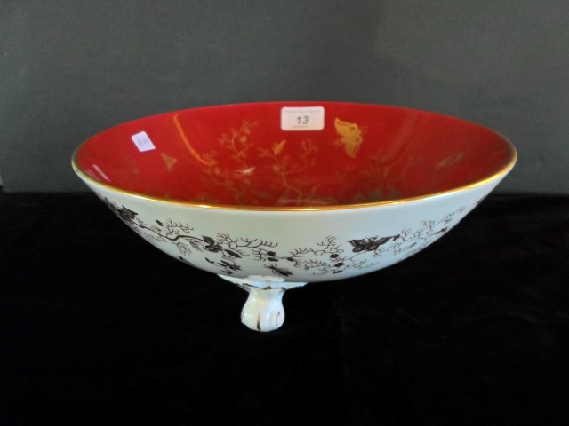 A Coalport fruit bowl, having Oriental birds and foliage in a gilt finish to a deep red ground,