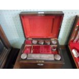 A late Victorian mahogany dressing table box, the interior containing bottles and jars,