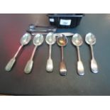 A mixed lot of silver flatware to include: teaspoons, sugar nips and others,