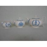 A Wedgwood embossed Queen's Ware 1953 Coronation tea set, comprising: teapot,