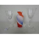 Two crystal cut wine glasses, together with an Italian glass spill vase.