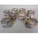 A collection of eight Lena Liu Enchanted Wings porcelain music boxes,