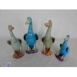 A collection of four early 20th century Chinese ceramic ducks, each decorated in polychrome enamel,