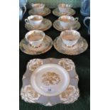 A Tuscan bone china part-tea service, comprising: six trios and a sandwich plate,