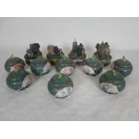 A collection of four Thomas Kinkade Lamp Light Treasures porcelain music boxes,