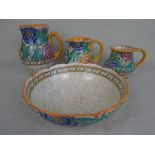 Four pieces of Crown Ducal Charlotte Rhead designed items, each in the Persian Rose (4040) pattern,