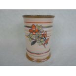 A 1930s Crown Ducal vase, designed by Charlotte Rhead in the 4528 Posy pattern,