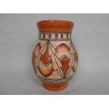 A 1930s Crown Ducal vase, designed by Charlotte Rhead in the Brown Lotus Leaves pattern, no.