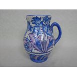 A 1930s Crown Ducal single handled vase designed by Charlotte Rhead in the Blue Peony pattern, no.