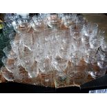 A large quantity of Edwardian and later glassware, to include: wine glasses, champagne bowls,