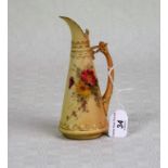 A Royal Worcester small ewer, having blush ivory decoration, hand painted foliate and gilt finish,
