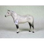 A Beswick grey horse, (19.7cm). Condition Report: Repair to one leg.