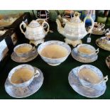 A Victorian part-tea service, comprising: teapot, twin handled covered sugar bowl,