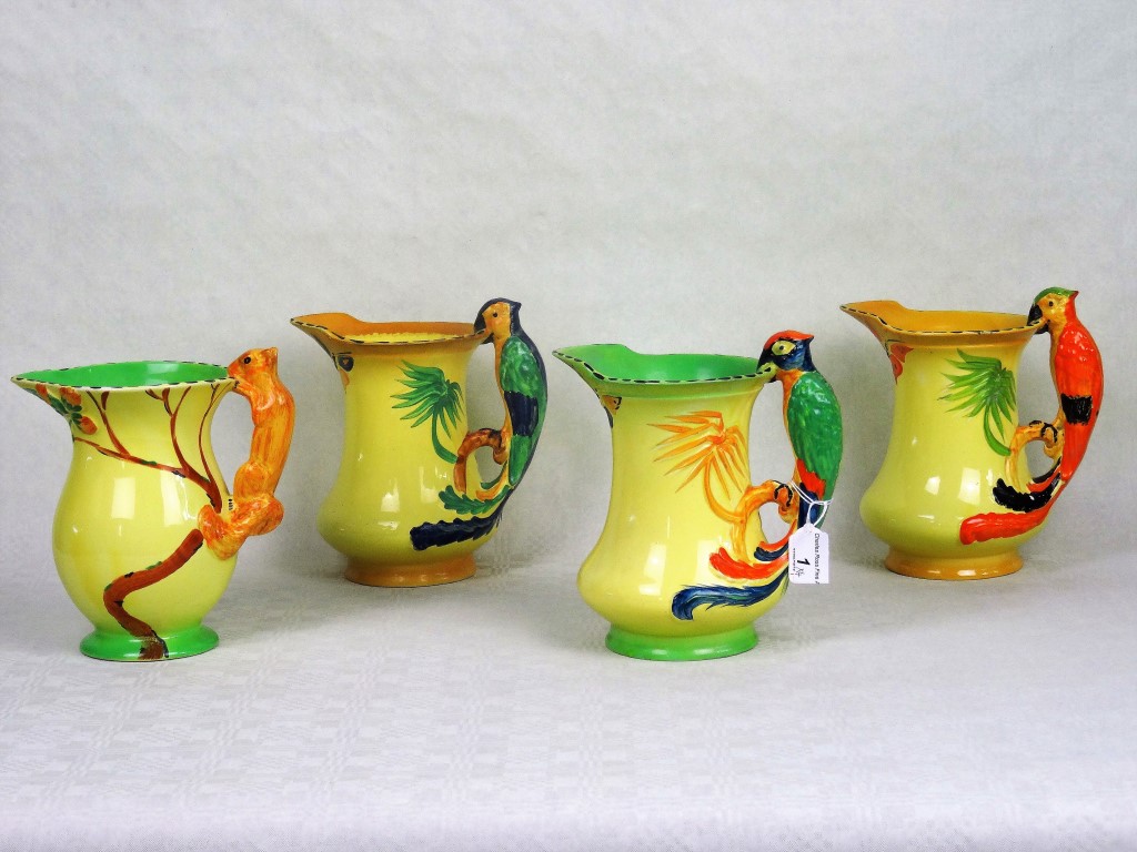 Four Burleigh ware jugs, three having parrot handles, the fourth with a squirrel handle. - Image 2 of 2