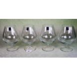 A set of four Dartington crystal large brandy balloons (17cm).