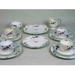 A Paragon china part-tea service, comprising: four trios, square plate, milk jug,