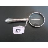 A silver handled magnifying glass, (13.5cm).