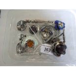 A quantity of silver and white metal brooches, some stone set,