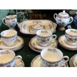 A Wedgwood Kutani Crane pattern part-tea service, comprising: six trios, covered sugar bowl,