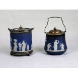 Two 19th century Wedgwood blue Jasperware biscuit barrels, each with plated mounts.