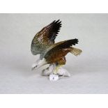 A Karl Ens ceramic model of an eagle, blue printed mark to base, (25cm).