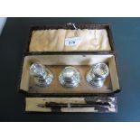 A cased three piece Victorian desk set,