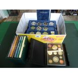 A good quantity of cased commemorate coin sets,