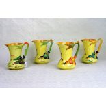 Four Burleigh Ware jugs, each with stylized bird to the handles.