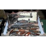 A good quantity of reproduction flintlock and other pistols,