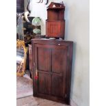A 19th century oak corner cupboard, 70cm wide,