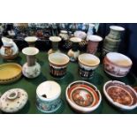 A large quantity of Jersey Pottery ceramics, to include: vases, planters,