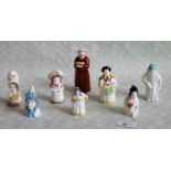 Eight Royal Worcester porcelain candle snuffers, to include examples named 'French Cook',