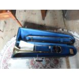 A Besson Stratford Trombone in fitted case.