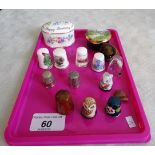 A commemorative enamel pill box, marking Queen Elizabeth II 60th Birthday,
