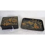 An early 20th century papier mache lidded box and a papier mache rectangular tray,