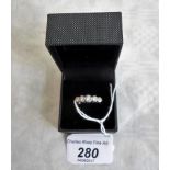 A five stone half hoop diamond ring,