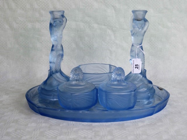 An early 20th century French blue glass dressing table set, comprising: oval tray,