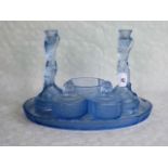 An early 20th century French blue glass dressing table set, comprising: oval tray,