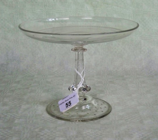 A Victorian clear glass tazza, having acid etched star and bead decoration, 14.8cm tall.