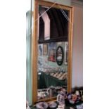 A large contemporary rectangular gilt framed mirror,